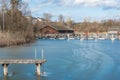 Boat house on the frozen Lake Chiemsee in winter Royalty Free Stock Photo