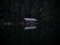 Boat house panorama mirror reflection view of alpine forest mountain lake Piburger See Oetztal Alps Tyrol Austria Europe Royalty Free Stock Photo