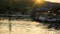 Boat and house with reflection water on the sea on the sunrise light in karimun jawa Royalty Free Stock Photo