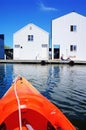 Boat house in Tacoma, WA and orange kayak. Royalty Free Stock Photo
