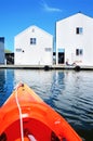 Boat house in Tacoma, WA and orange kayak Royalty Free Stock Photo