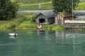 Boat houses on the shore of Nordfjord Olden Norway Royalty Free Stock Photo