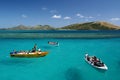 Boat hover on turquoise blue ocean