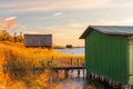 Boat huts in Plau on the Mecklenburg Lake District in Germany at sunset