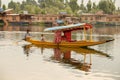 Boat and indian people in Dal lake. Srinagar, Jammu and Kashmir state, India Royalty Free Stock Photo