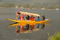 Boat and indian people in Dal lake. Srinagar, Jammu and Kashmir state, India Royalty Free Stock Photo