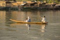 Boat and indian people in Dal lake. Srinagar, Jammu and Kashmir state, India Royalty Free Stock Photo