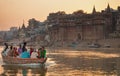 Boat with indian pilgrims on the Ganges