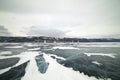 Boat for kitewing frozen ice on a beautiful lake on a background of blue sky Royalty Free Stock Photo