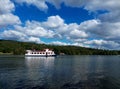 Boat lake autumn forest nature sun sky clouds blue