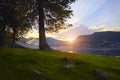 Boat on lake at background of sunset in a clear summer day. Warm summer evening on the dock near the boat. Fabulous views Royalty Free Stock Photo