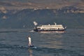 Boat on Lake Leman on a summer sunset.