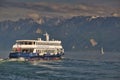 Boat on Lake Leman on a summer sunset.