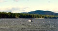 Boat, lake, mountain, autumn landscape Royalty Free Stock Photo