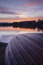 A boat on a lake's shore