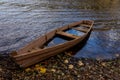 The boat in the lake was full of water Royalty Free Stock Photo