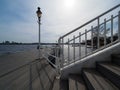 Boat landing-stage with old white lantern Royalty Free Stock Photo