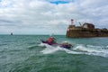 Boat leaving the port of Granville in Normandy