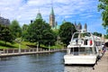 Boat lined Rideau Canal and Parliament Hill, Ottawa, Ontario, Canada Royalty Free Stock Photo