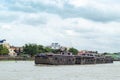 A boat load of sand in the Chao Phraya River , Thailand