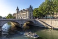 Boat loaded with tourists sail on the Seine, in the heart of Paris, near the Notre Dame Cathedral