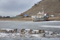 Boat locked in ice in a frozen lake Khuvsgul in northern Mongoli Royalty Free Stock Photo
