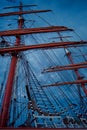 Boat mast and rigging by dramatic cloudy day