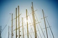 Boat masts against a clear blue sky. Royalty Free Stock Photo