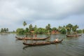 Boat men engage in the sand mining