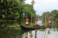 Boat men engage in the sand mining