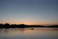 Boat on mississippi river during sunset in la crosse wisconsin Royalty Free Stock Photo