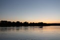 Boat on mississippi river during sunset in la crosse wisconsin Royalty Free Stock Photo