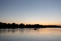 Boat on mississippi river during sunset in la crosse wisconsin Royalty Free Stock Photo