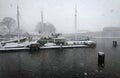 Boat in the mist in Amsterdam harbor Royalty Free Stock Photo