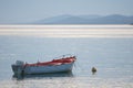 Boat moored on calm sea