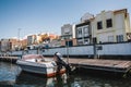 boat is moored on the canal in Aveiro, Portugal. View of the Sao Roque canal with old buildings