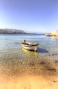 Boat Moored at the Beach of the Beautiful Fishing Village of Cefalu on Sicily, Italy Royalty Free Stock Photo