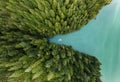 Boat moored in cove with green forests aerial view Royalty Free Stock Photo