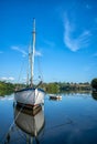 Boat moored in cove near Dittisham, Devon Royalty Free Stock Photo