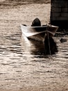 Boat moored by pier Royalty Free Stock Photo