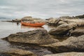 Boat moored in Punta Cabalo lighthouse  on the island of Arousa  Galicia Royalty Free Stock Photo