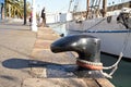 Boat moored to a ship bollard