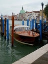 Boat moored and typical buildings on the Grand Canal Venice Italy Royalty Free Stock Photo