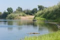 Boat with a motor on the river bank. Fishing in  summer Royalty Free Stock Photo