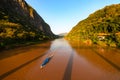 Boat on Nam Ou River at Nong Khiaw Laos, sunset sky, famous travel destination backpacker in South East Asia Royalty Free Stock Photo
