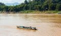 Boat near the bank of the river Nam Khan in Luang Prabang, Laos. Copy space for text.