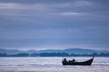 Boat near beach on low tide