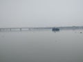 A boat near bridge in river Ganga, Natural view Royalty Free Stock Photo
