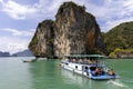 Boat near entrance to a lagoon in tropical Koh Hong island is famous tour in Andaman sea, Thailand.