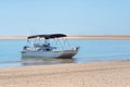 Boat near the sandy beach in Crystal Coast, North Carolina